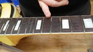 Degunk Your Guitar - Use a Razorblade to Scrape your Dirty Fingerboard Clean.