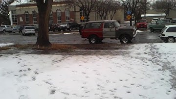 78 Bronco with open headers.