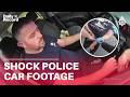 Shocking footage as man drives away as police officer HANGS from door