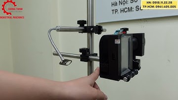 Máy in date cầm tay MX3 kết hợp giá đỡ và băng tải chạy tự động