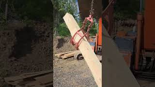 13-Year-Old Uses Excavator Grapple to Build Log Cabin Garage
