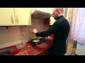 Максим Тесак делает омлет из страусиного яйца