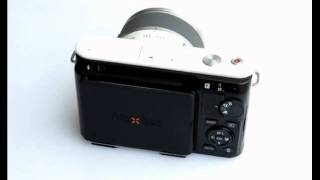 Nikon J1 with Flipbac Viewfinder and G4 grip - flipbac.com