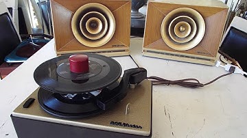 RCA 45-J-2 STEREO record player playing a stack of 45 RPM records.