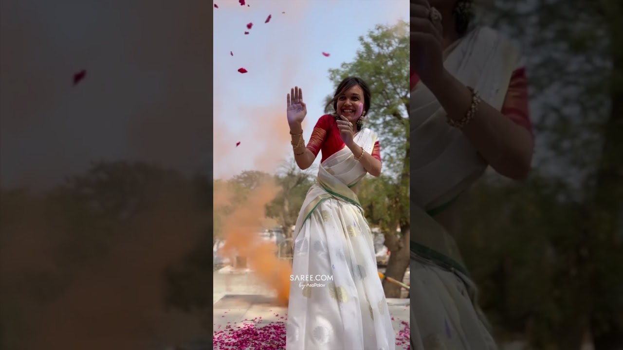 Happy Girl Celebrates Holi & Dhuleti In White Saree
