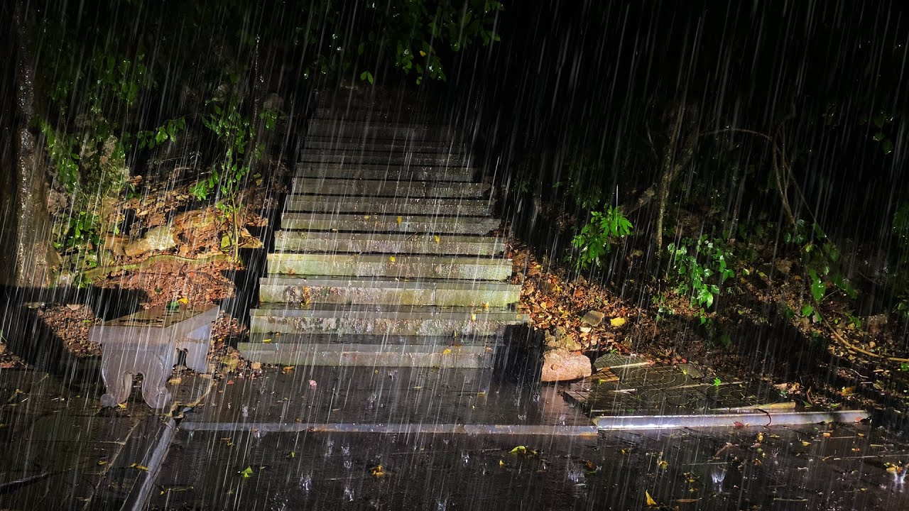 Heavy Rain Like Waterfall Pours from Mountain onto Quiet Terraced Steep ...