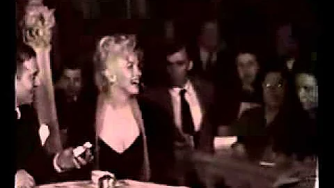 Marilyn Monroe and laurence olivier at feb 1956 press conference. footage