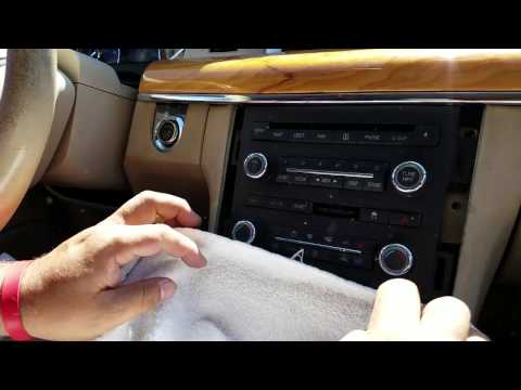 How to Remove Radio / Navigation / CD Player from Lincoln MKS 2009 for Repair.