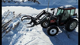 Installing extra hydraulic function on tractor for a grapple