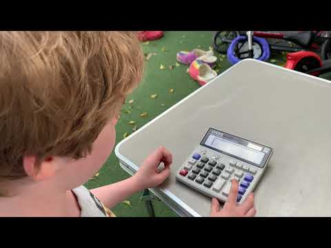 Abraham shows how to use the Plus (+) and Minus (-) buttons on a calculator