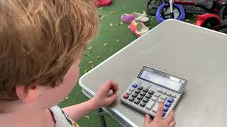Abraham shows how to use the Plus (+) and Minus (-) buttons on a calculator screenshot 4