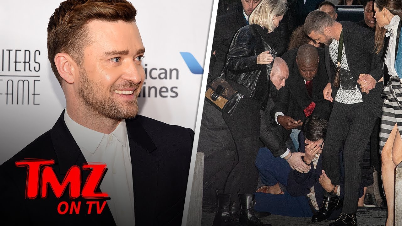 Justin Timberlake tackled by prankster at Louis Vuitton show