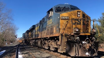 CSX  I022 racing thru CP64 with a website logo AC44 163