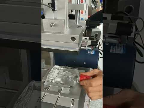 A Manual Labeling Machine For Flat Surface Bottles Box Package 