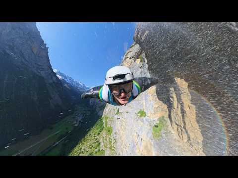 Beautiful morning wingsuit flight through a waterfall!