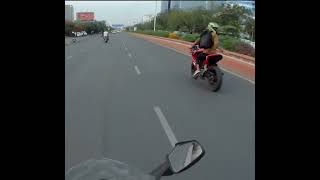 Biker Barely Avoids Crashing Into Pedestrians Crossing The Street
