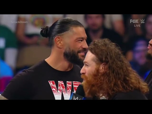 Sami Zayn makes Roman Reigns and Logan Paul break character 😂 class=