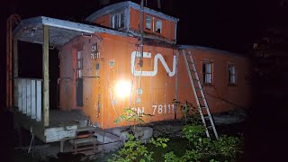 Abandoned train caboose in the woods