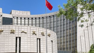 China Cuts Forex Reserve Ratio in Bid to Support Yuan