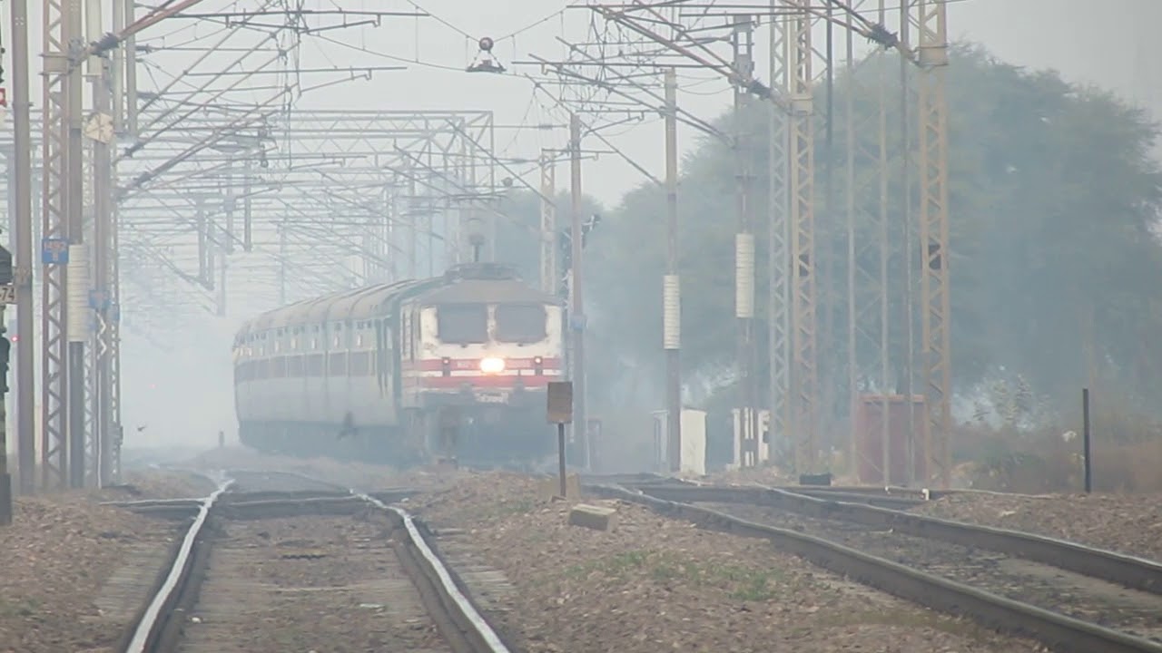 12910 Bandra Garib Rath express shows 130 action at asaoti - YouTube