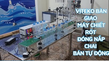 Bàn giao máy chiết rót và đóng nắp chai bán tự động Khách hàng Hà Nội