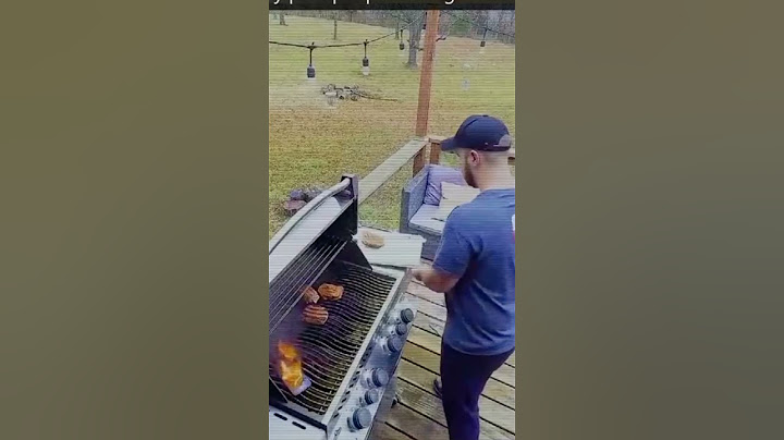 Barbecues His iPhone Along with the Burgers!