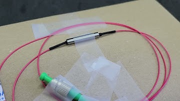 Saturable absorber in transmission mode for laser mode-locking, for instance in a fiber ring laser