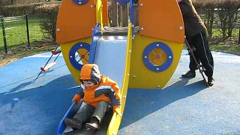 My big cousin Gabriel on the slides.