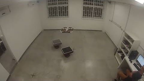 Trajectory tracking of a Heterogeneous Formation Using Null Space Based Control 2 UGV + 1 UAV