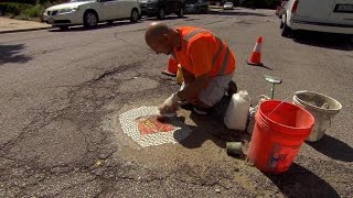 Filling potholes with art