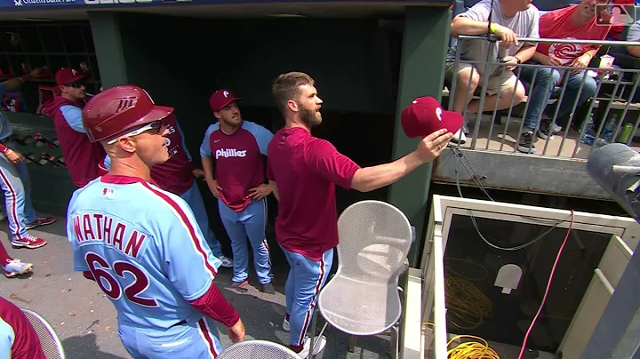 Bryce Harper wheels and deals with a fan for his hat Citizens Bank Park