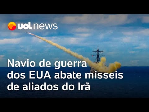 Navio de guerra dos EUA abate mísseis de aliados do Irã; base americana é atacada no Iraque