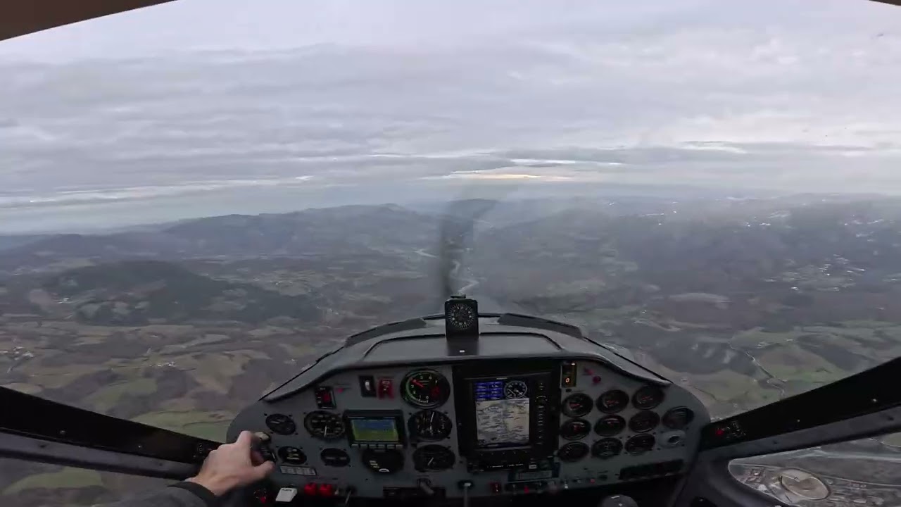 Tecnam P92 - Visiting Mt. Penice, some turbulence near the clouds
