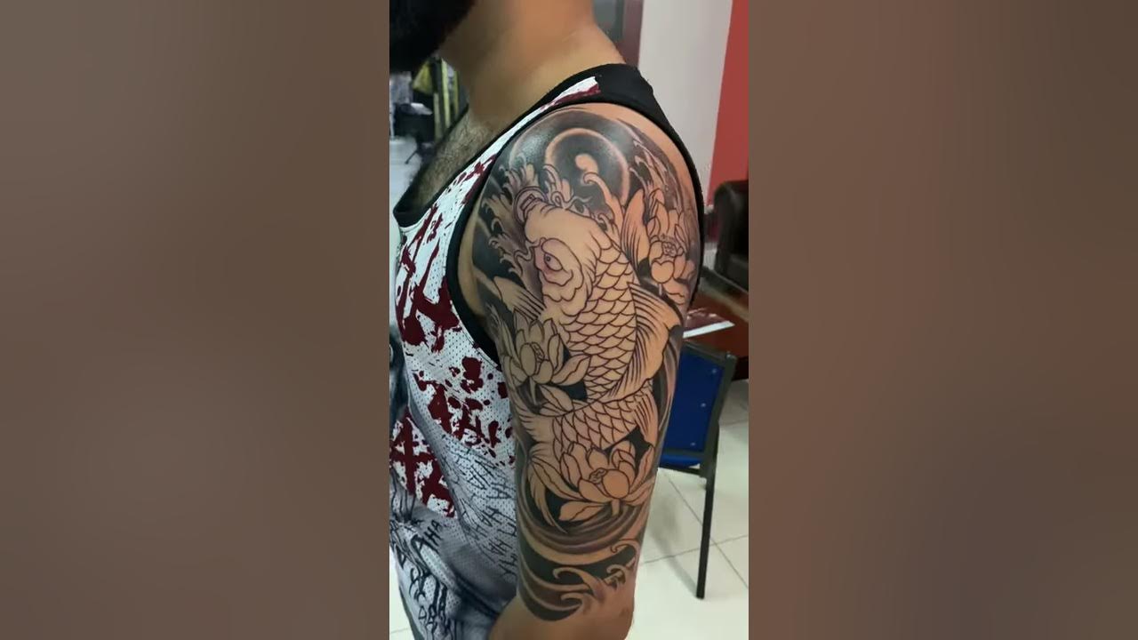 Koi fish half sleeve tattoo in progress..... - YouTube