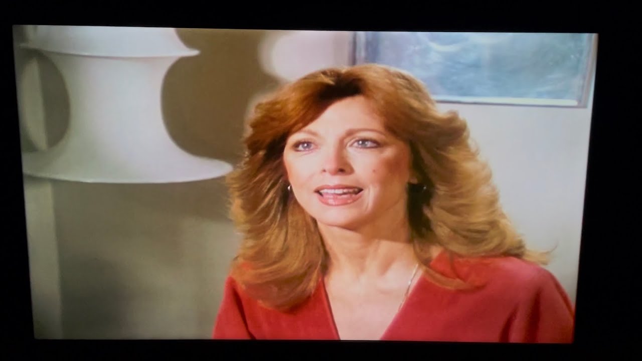 Dallas: Julie Grey blackmails J.R. Ewing.