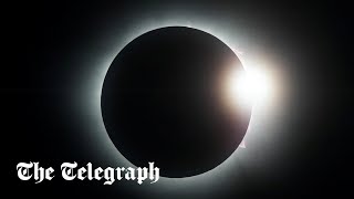 video: Cities plunged into darkness as solar eclipse sweeps US