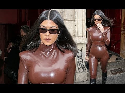 Kourtney Kardashian, 40, shows off her incredible figure in a skintight latex outfit at Kanye West's