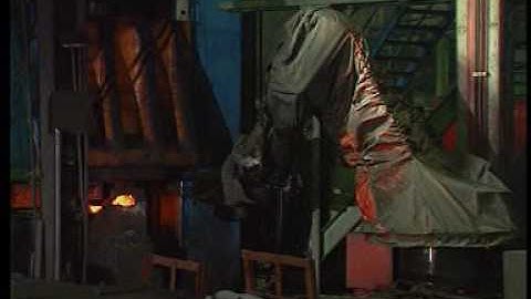 KUKA robot handles truck axles at forging press