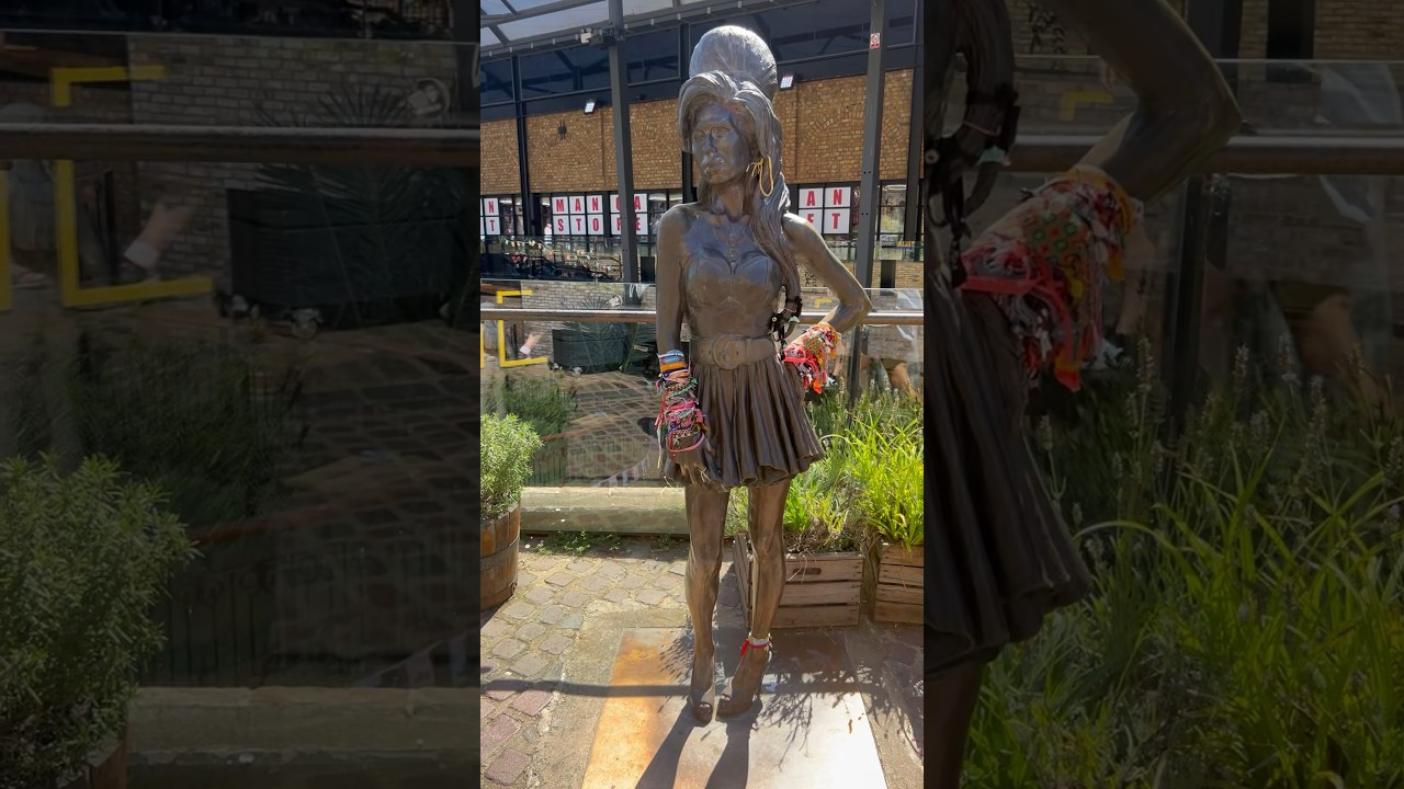 Watch Bronze statue of Amy Winehouse in Stables Market in Camden Town. It was sculpted by Scott Eaton. on YouTube Watch Bronze statue of Amy Winehouse in Stables Market in Camden Town. It was sculpted by Scott Eaton. on YouTube