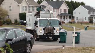 Henrico county trash truck picking up the neighborhoods trash