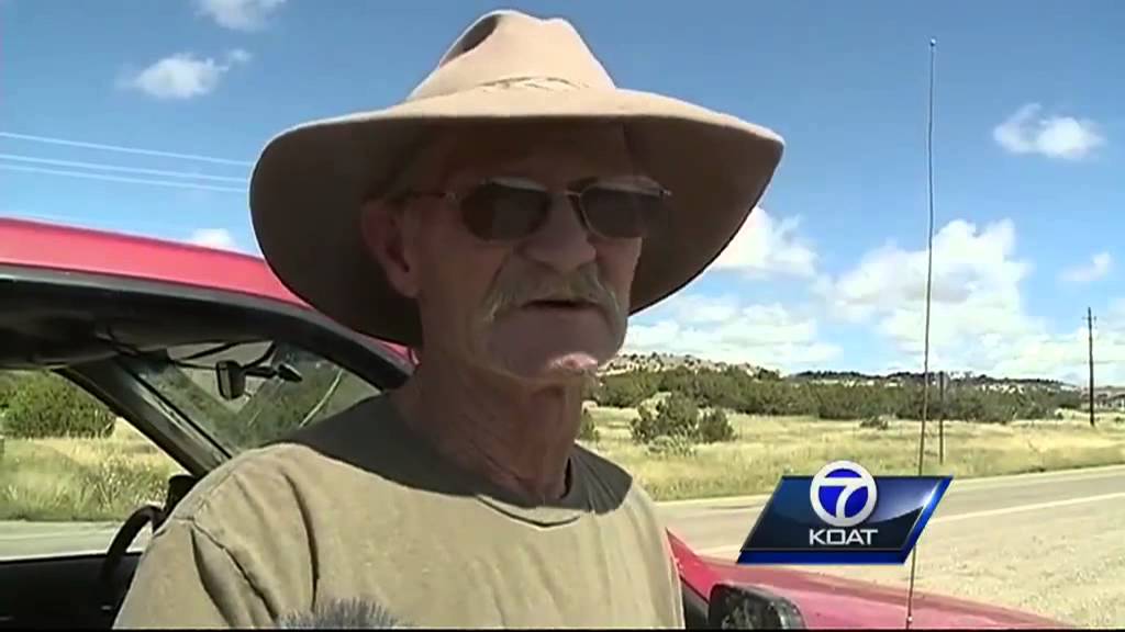 People stranded in cars by flooding in Santa Fe County