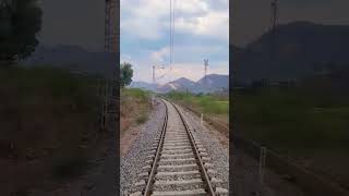 Train Curving Through Beautiful Aravali Hills Near Udaipur #Indianrailways #Railwayelectrification