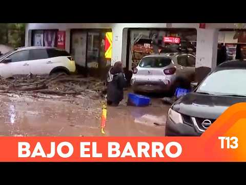Incredible footage shows local business hit by mudslide in Las Condes: Car ends up inside