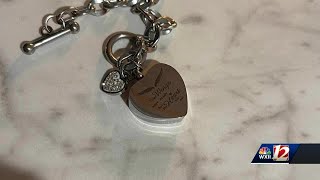 Triad woman asking for help in finding bracelet that has baby's ashes in it