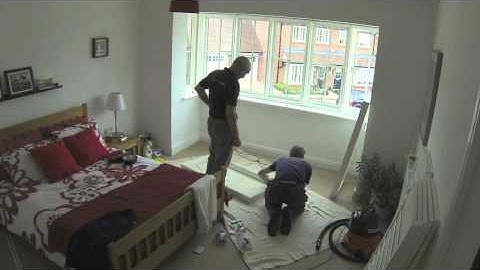 Installing wooden shutters in a square bay window made easy