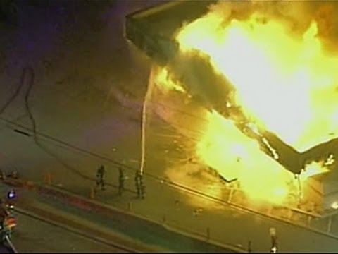 Raw: Cars, Stores Torched in Ferguson