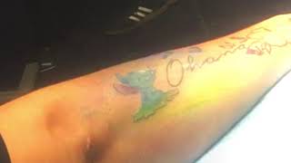 stitch and Ohana forearm tattoo