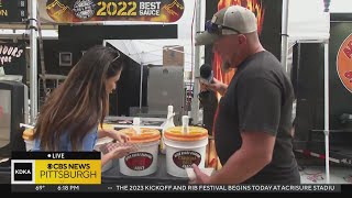 Mary Ours tries food at Rib Fest