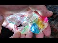 We can find watermelon tourmalines on the rocks in the forest. Gems, crystals, gold。碧玺，宝石，水晶，金矿