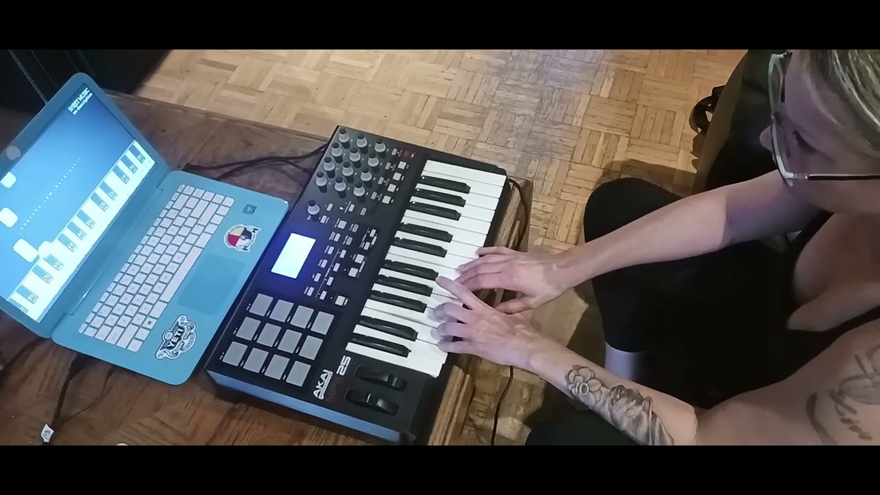 Lynn playing the keyboard